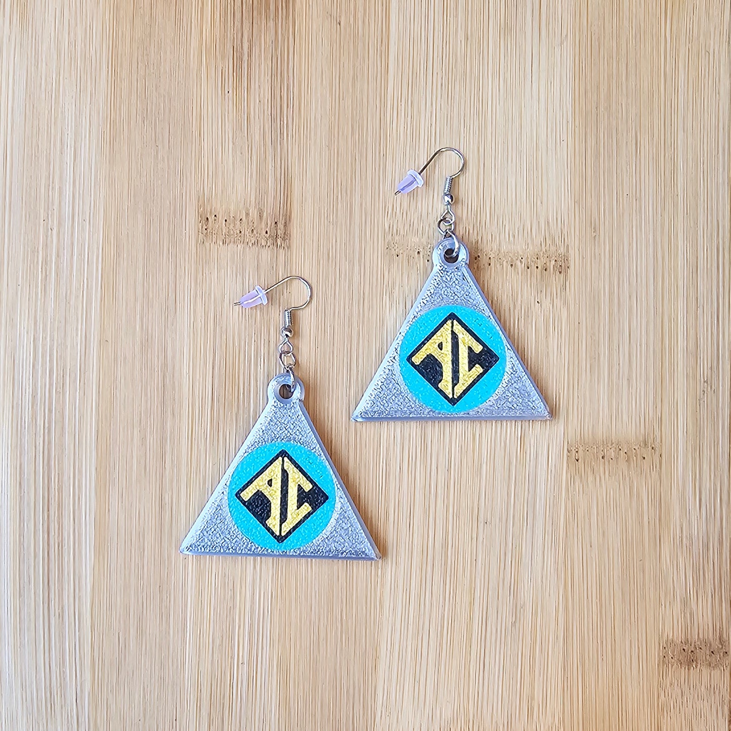 AI (AndrAIa variant) Badge Earrings -ReBoot
